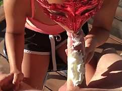 Sexy asian woman gives, whipped cream, cream